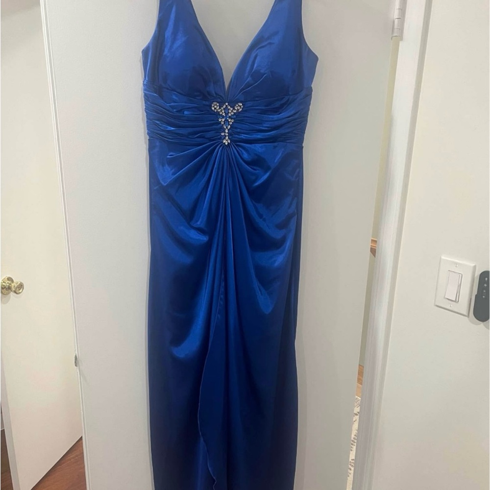 Worn once - beautiful long blue formal dress with bustle in the back.